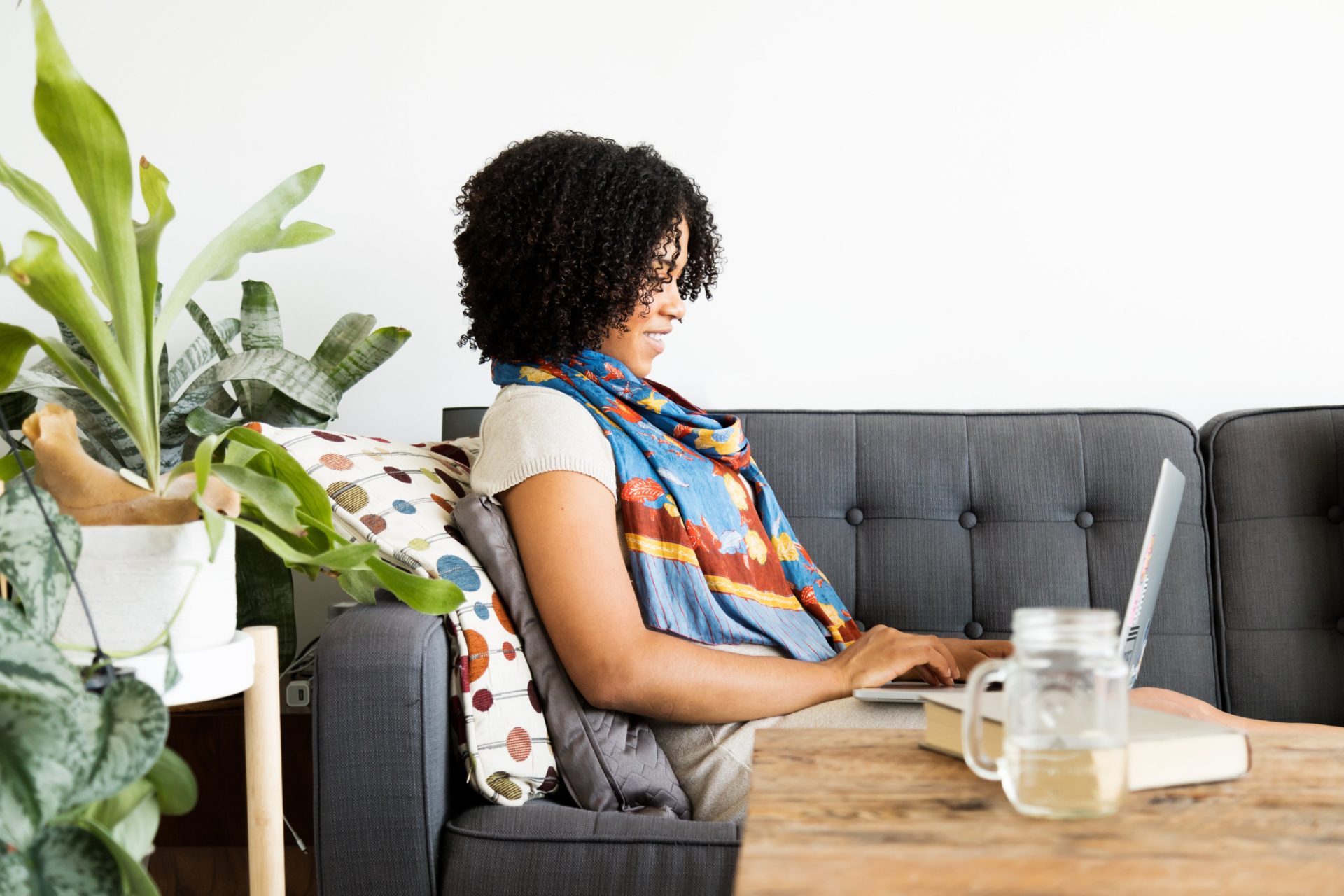 Woman works at home on computer