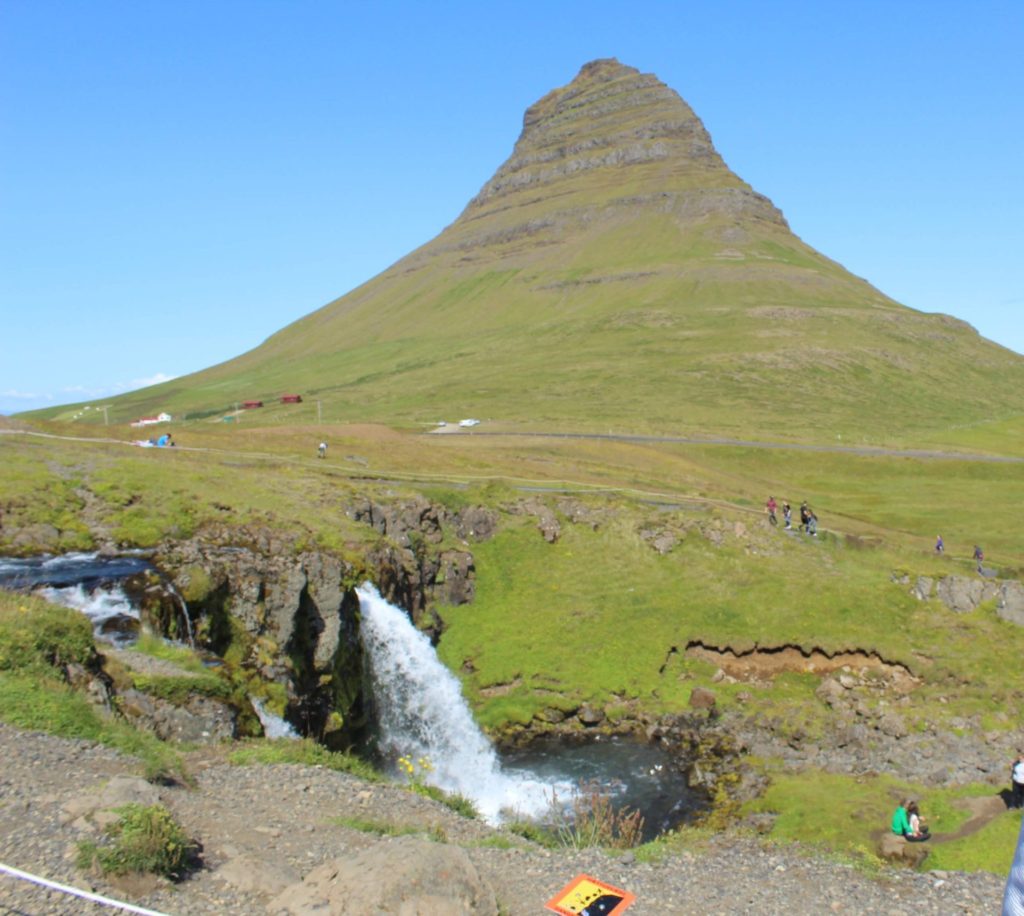 Kirkjufellsfoss waterfall and Kirkjufell mountain