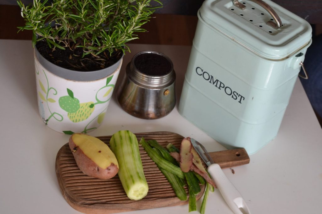 Vegetables with compost tin