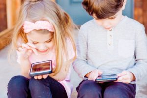 Children using mobile phones