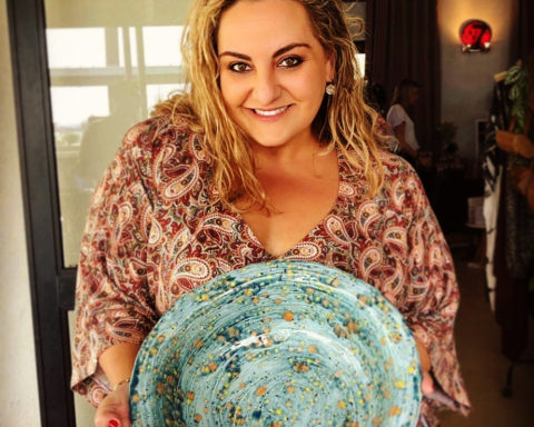 Woman holding ceramic bowl