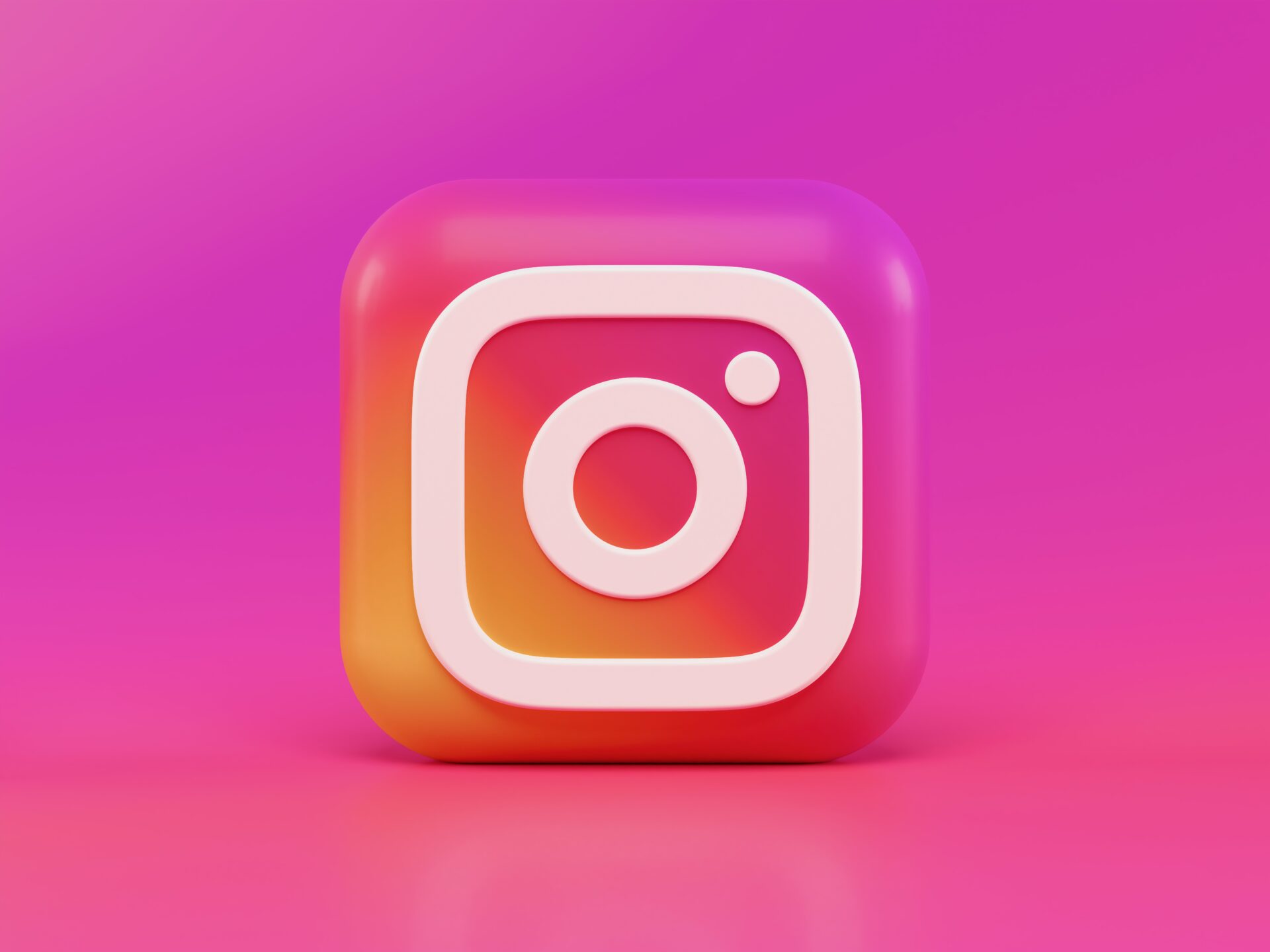 Instagram icon on bright pink background