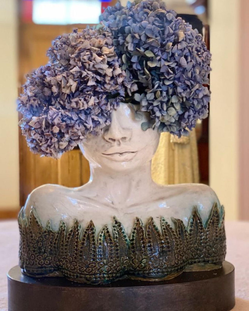 muse vase with flowers