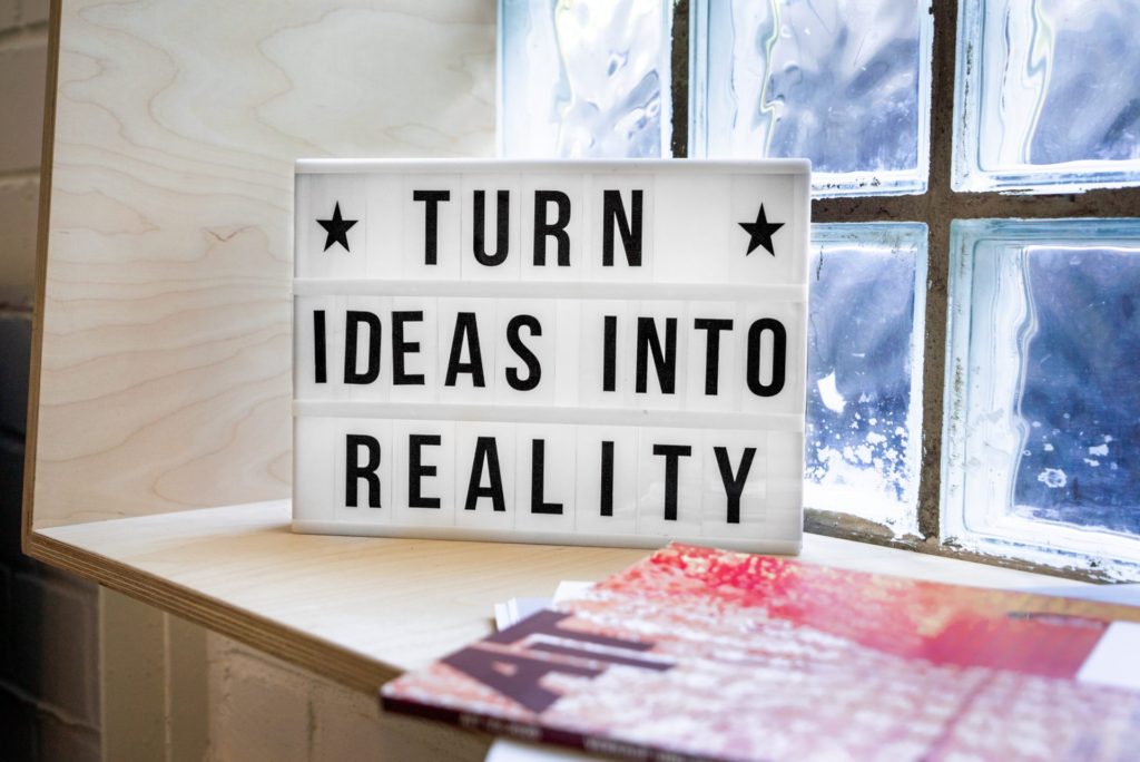 Turn ideas into reality sign