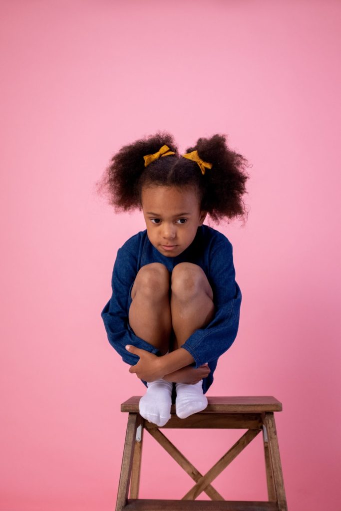 anxious girl on chair