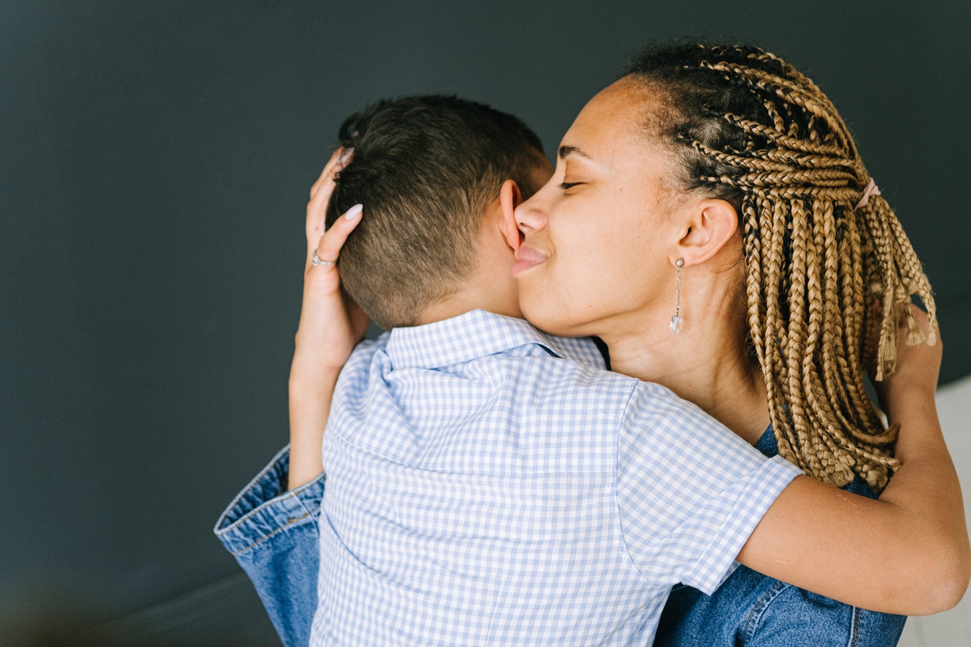 Woman hugging child