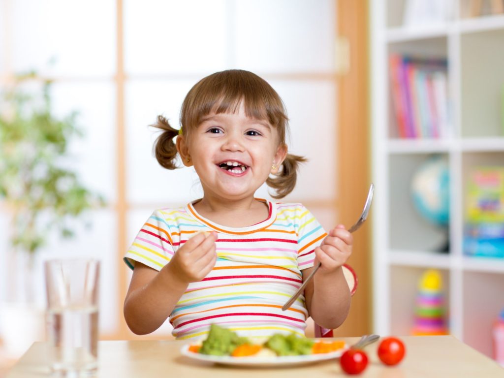 A child eating healthy snacks